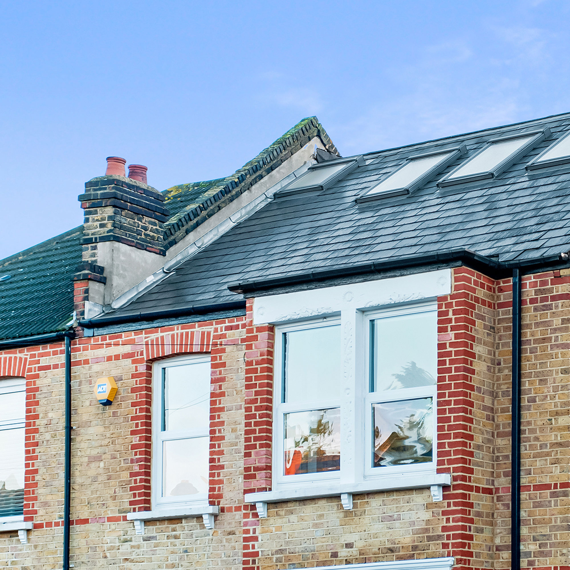Terraced houses with new roofing installation