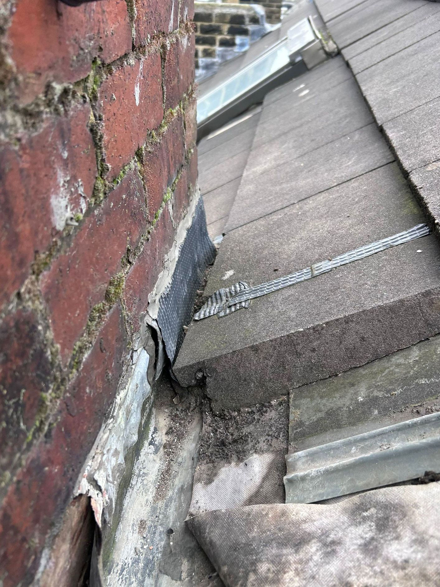 Professional roof repair work in progress